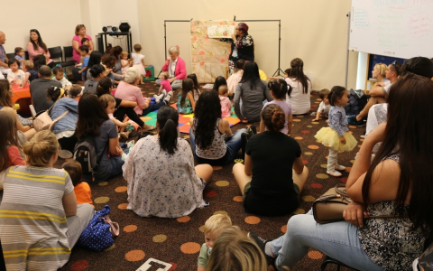 Children and caregivers enjoying Play with Me event