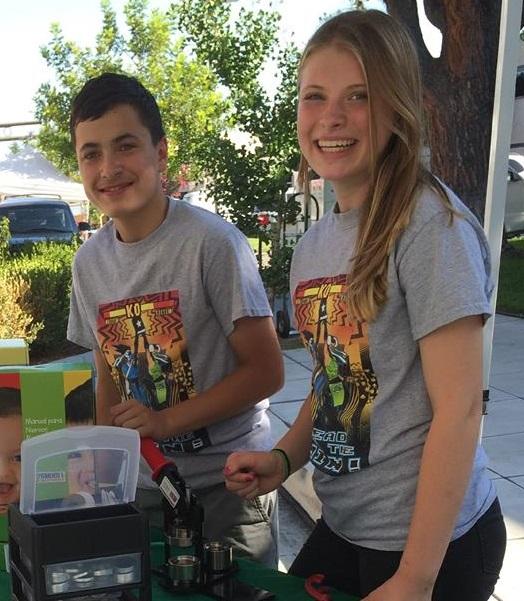 Two Teen Advisory Board members smiling during meeting