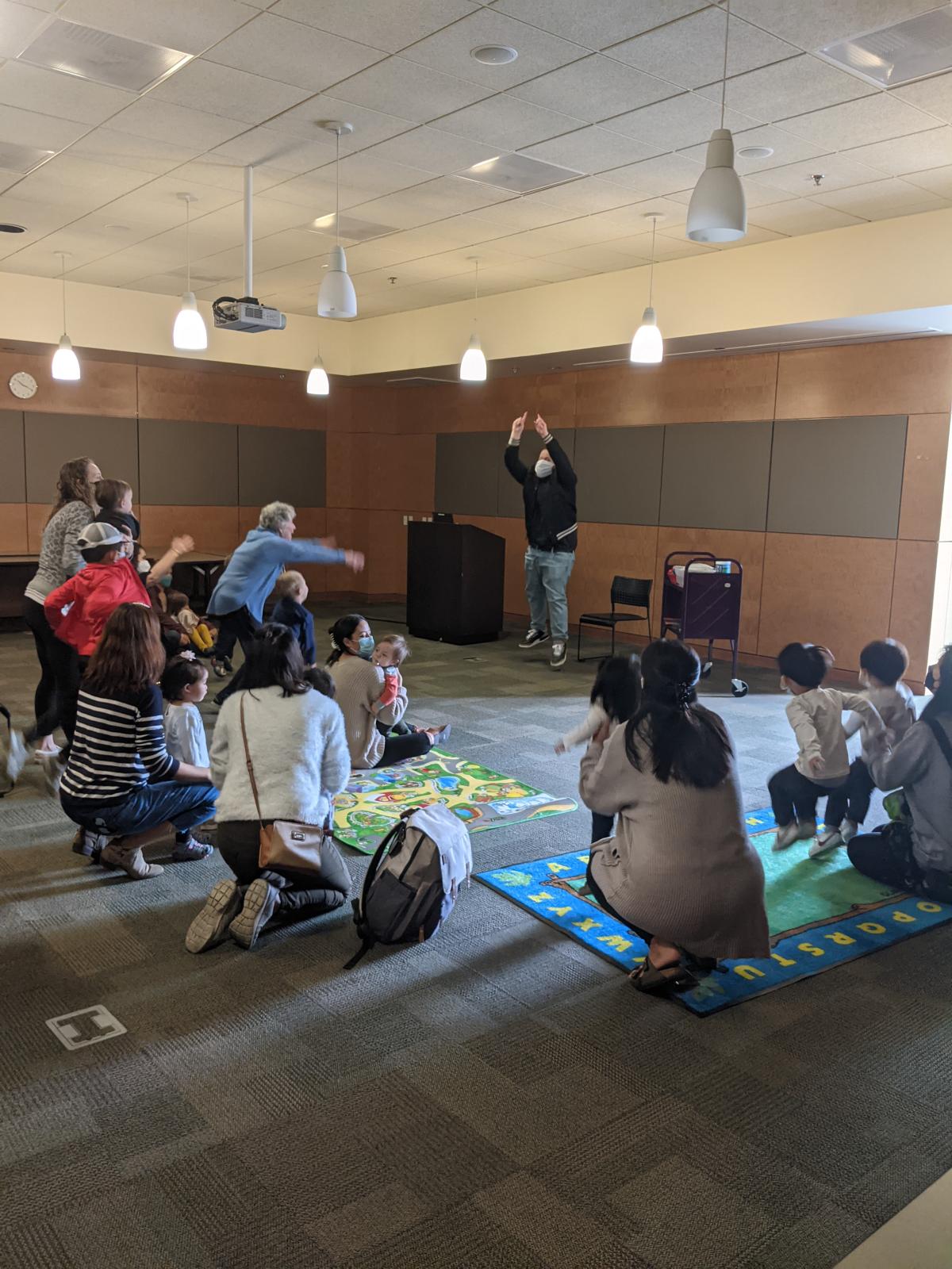 Storytime with people in the MPL's Community Room